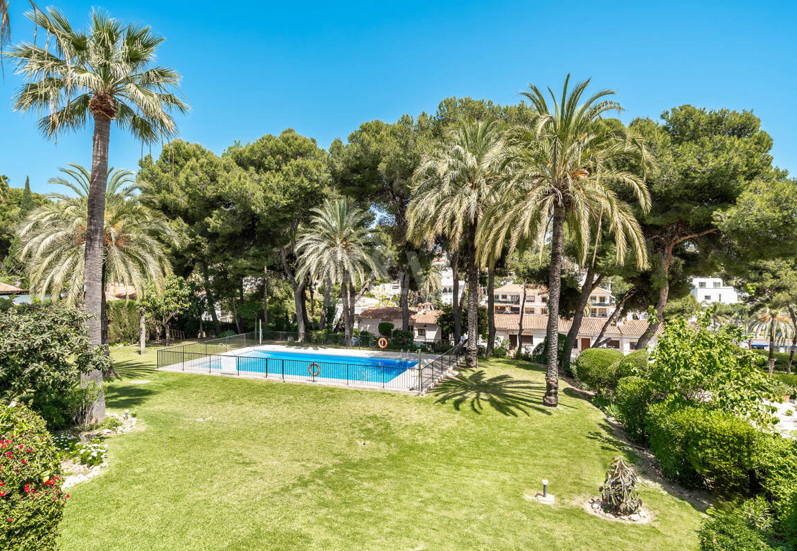 Rare Opportunity: Spacious Apartment with Garden, Pool & Sea Views