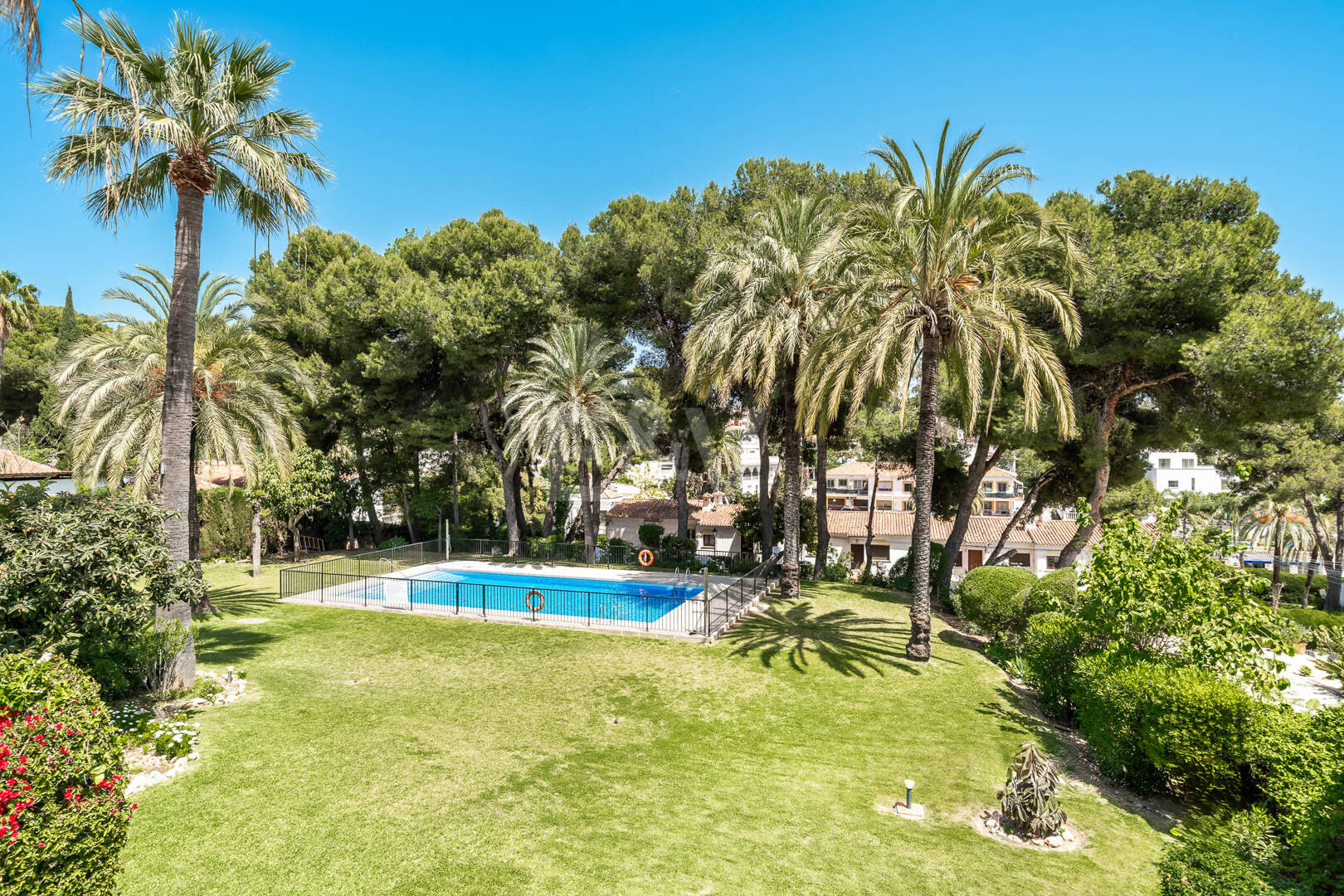 Rare Opportunity: Spacious Apartment with Garden, Pool & Sea Views