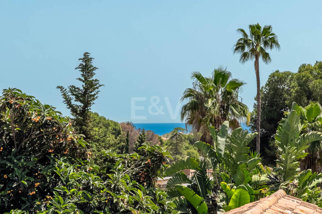 Rare Opportunity: Spacious Apartment with Garden, Pool & Sea Views