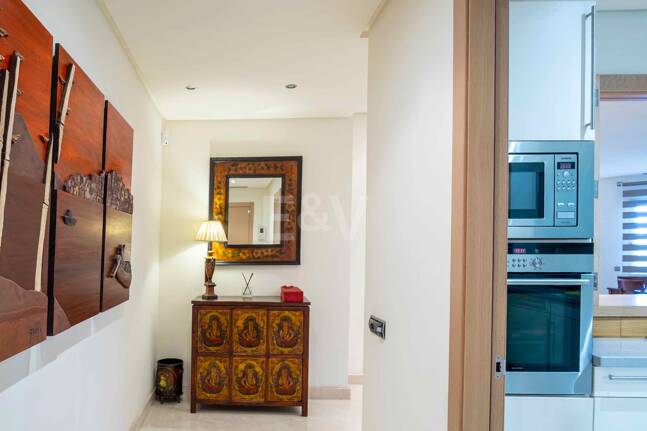 Elegante apartamento orientado al sur con vistas panorámicas al mar en Mansion Club