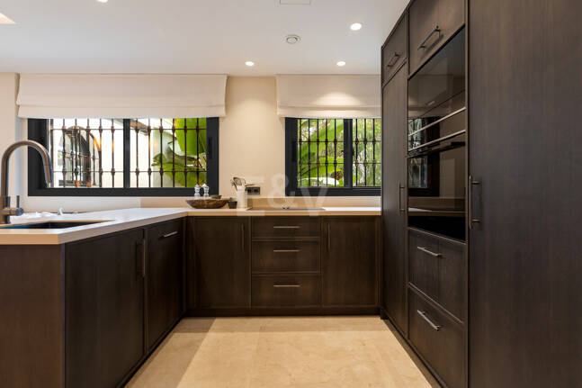 Impeccable Garden Apartment in a Prime Golden Mile Setting