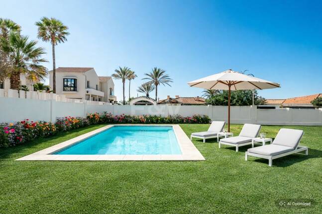 Contemporary Beachside Villa Just Steps from the Sea with Panoramic Views