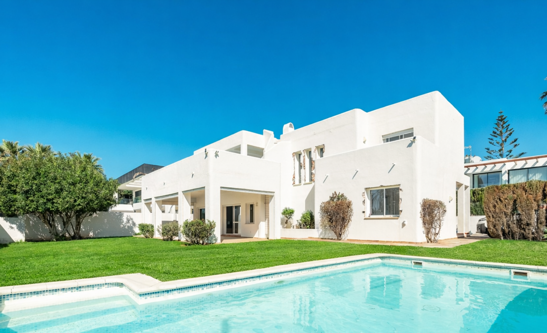 Contemporary Beachside Villa Just Steps from the Sea with Panoramic Views