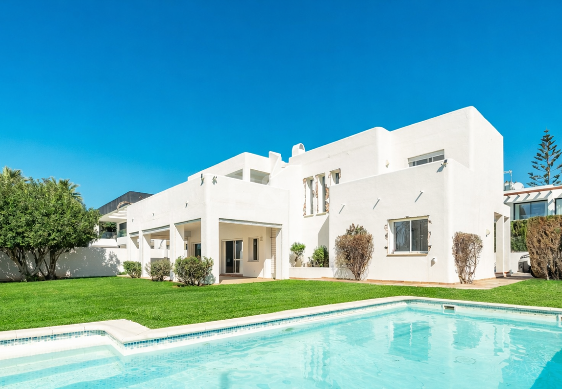 Contemporary Beachside Villa Just Steps from the Sea with Panoramic Views