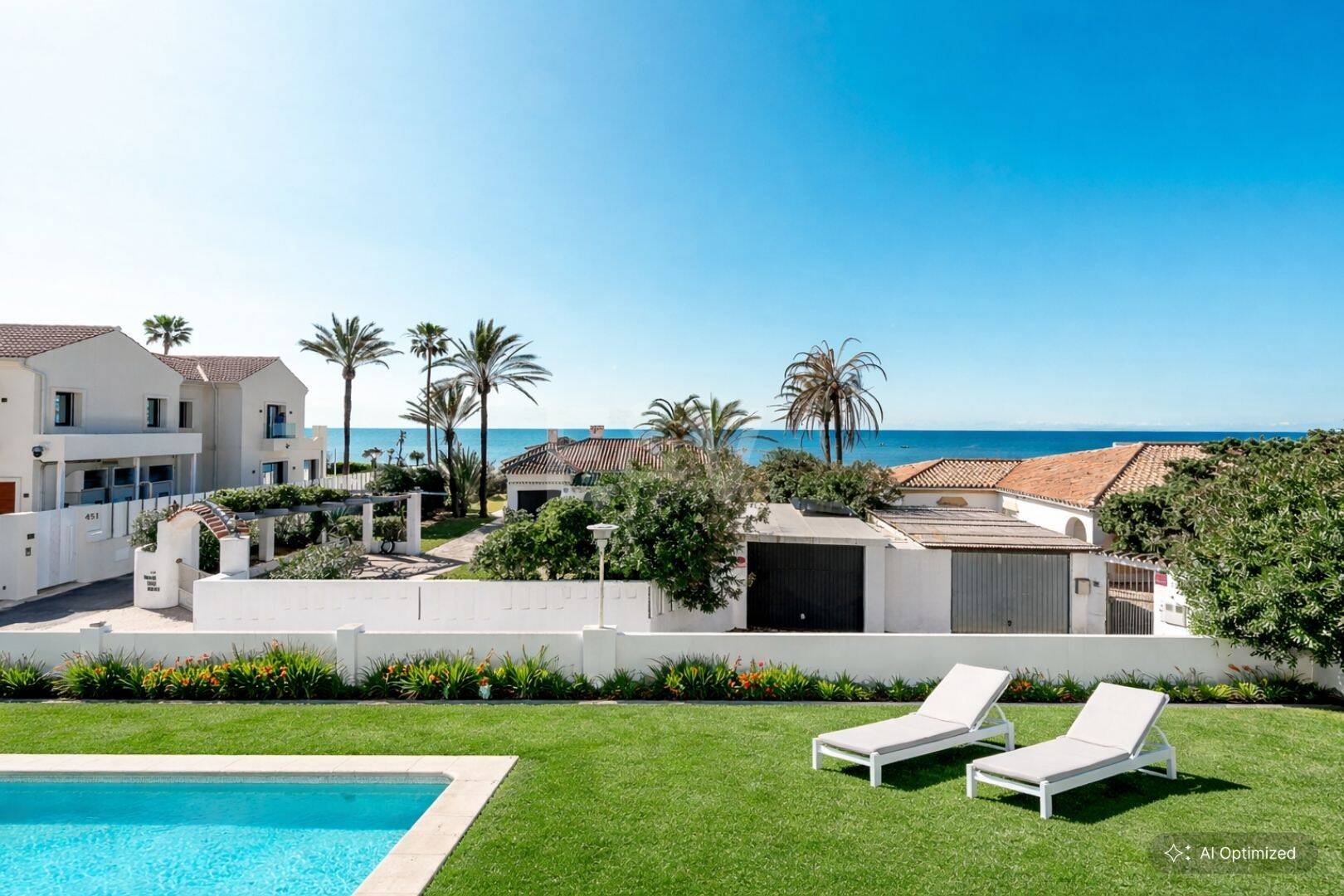 Contemporary Beachside Villa Just Steps from the Sea with Panoramic Views