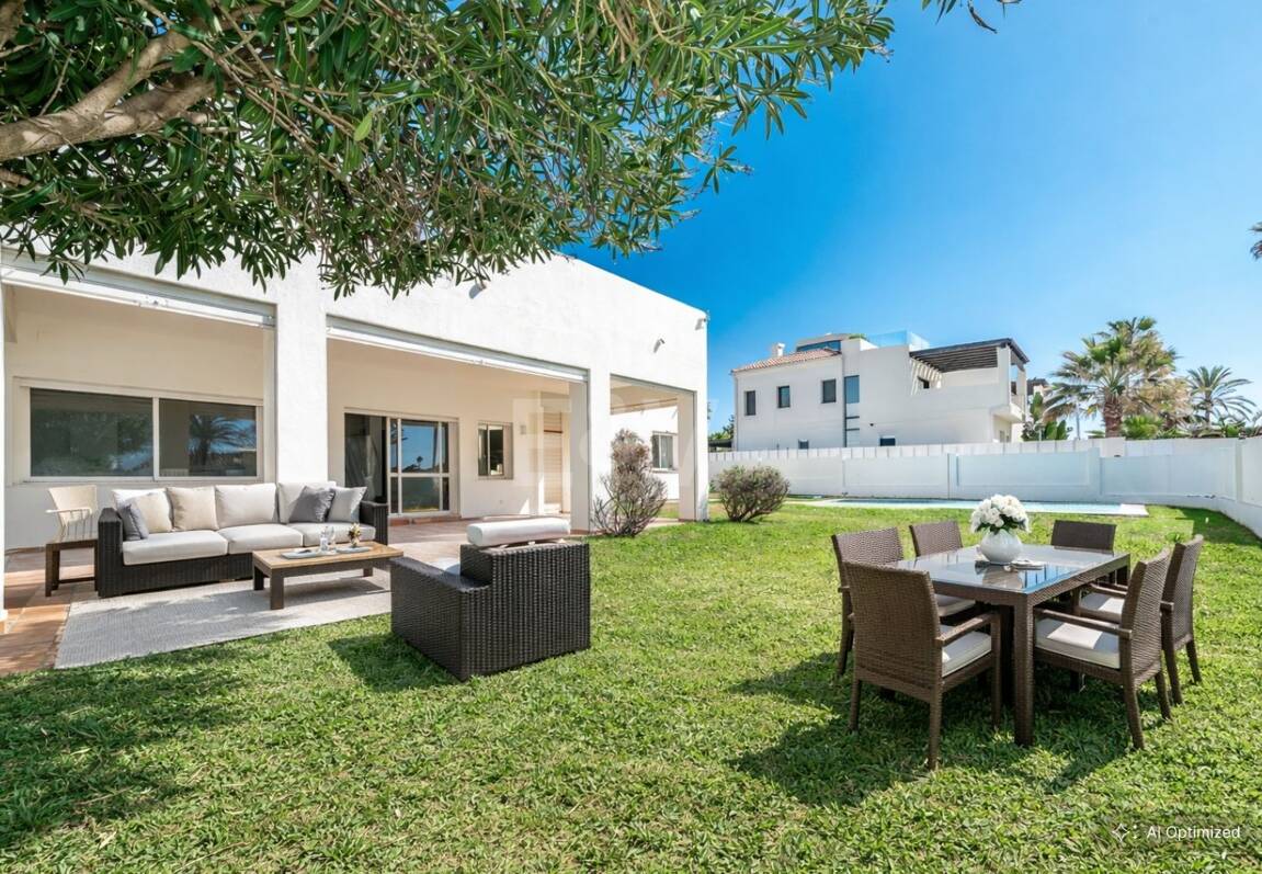 Contemporary Beachside Villa Just Steps from the Sea with Panoramic Views
