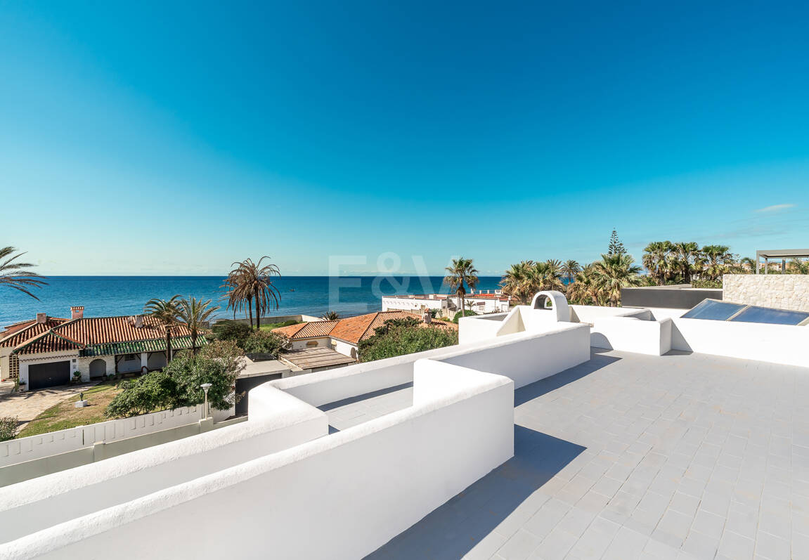 Contemporary Beachside Villa Just Steps from the Sea with Panoramic Views