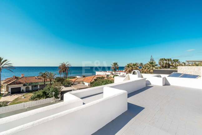 Contemporary Beachside Villa Just Steps from the Sea with Panoramic Views