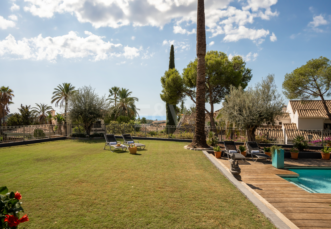 Andalusian Golf-Side Villa with Panoramic Sea Views