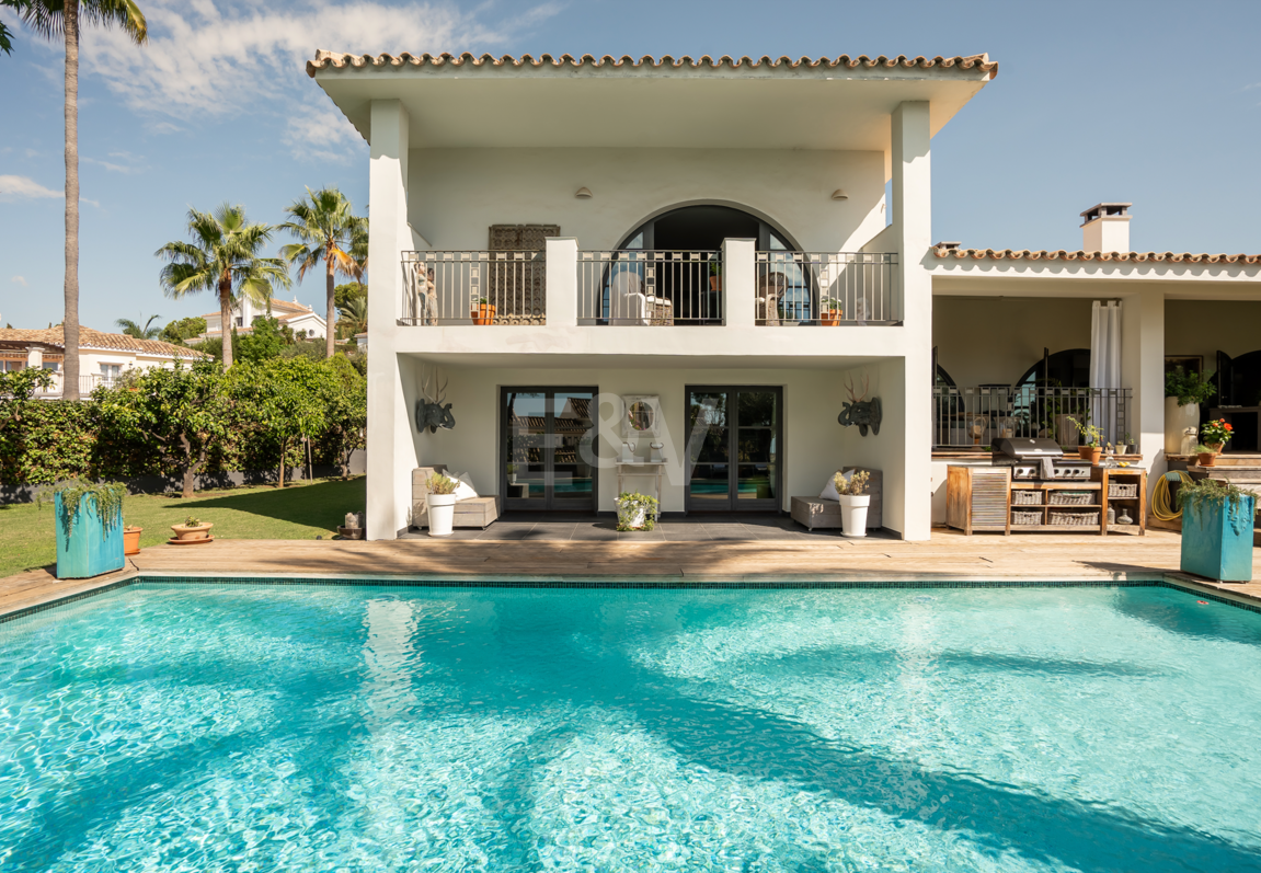 Andalusian Golf-Side Villa with Panoramic Sea Views