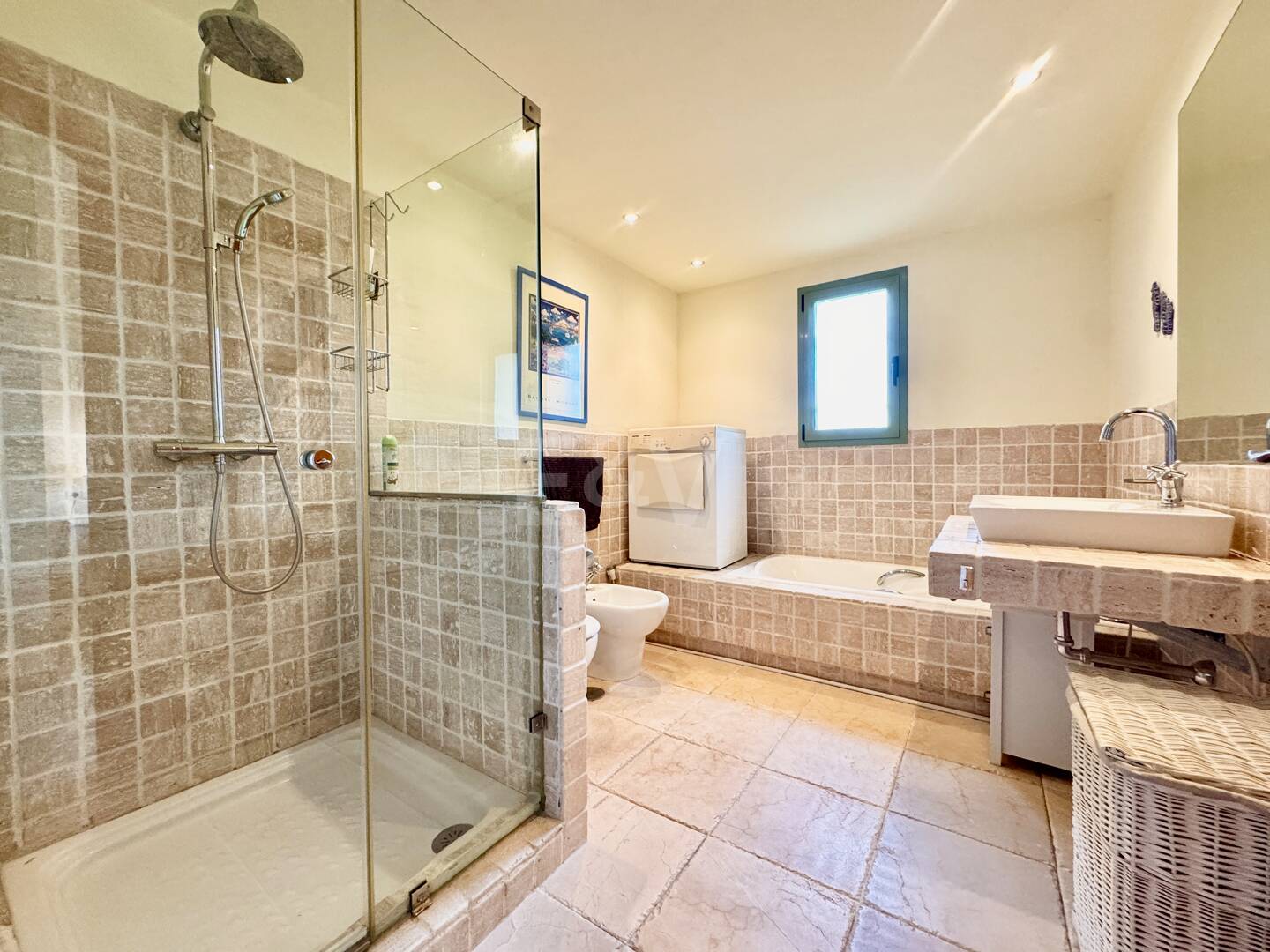 Appartement au rez-de-chaussée dans une communauté de prestige avec jardin privé et terrasse