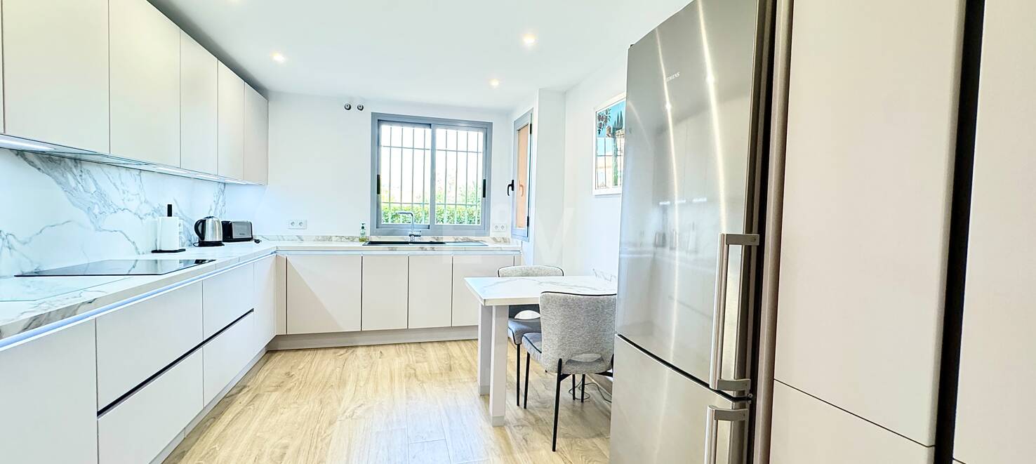 Ground-Floor Apartment in Prestigious Gated Community with Private Garden and Terrace