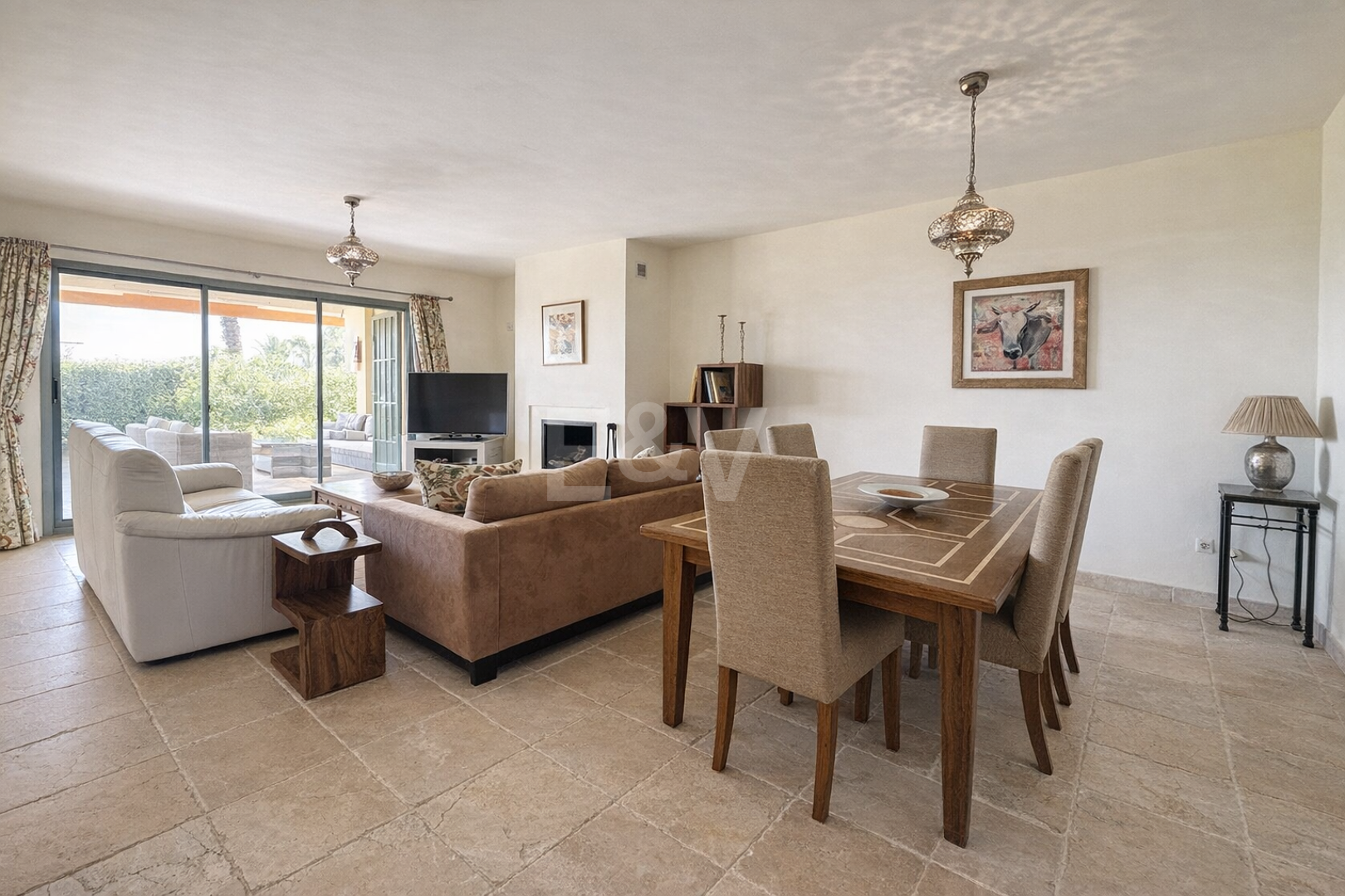 Appartement au rez-de-chaussée dans une communauté de prestige avec jardin privé et terrasse