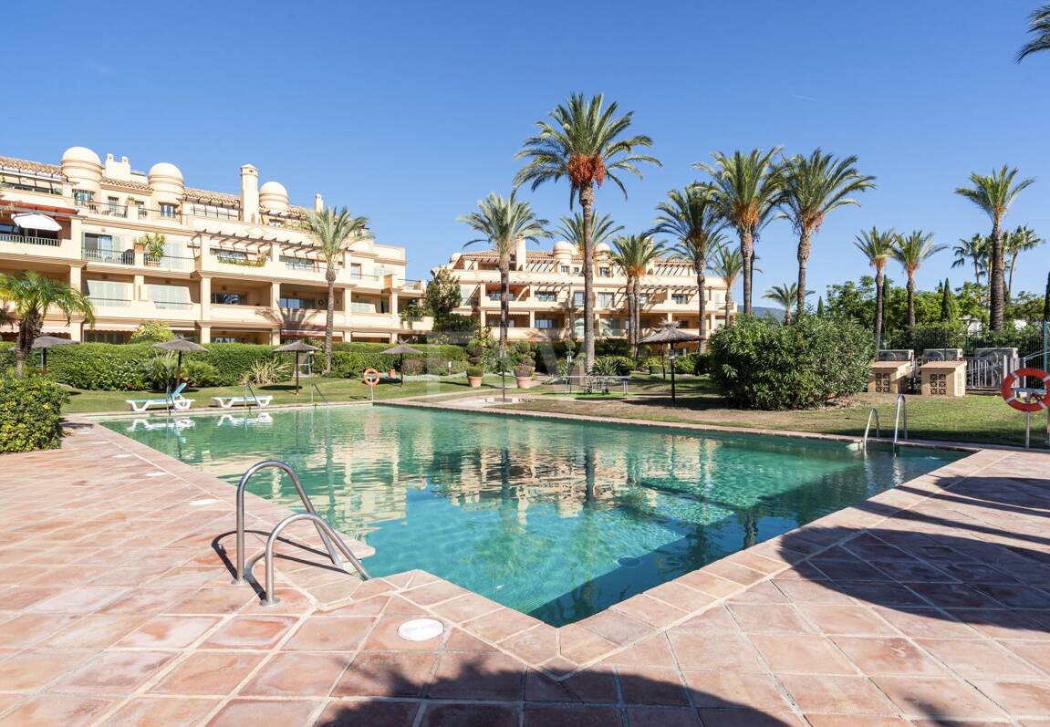 Appartement au rez-de-chaussée dans une communauté de prestige avec jardin privé et terrasse