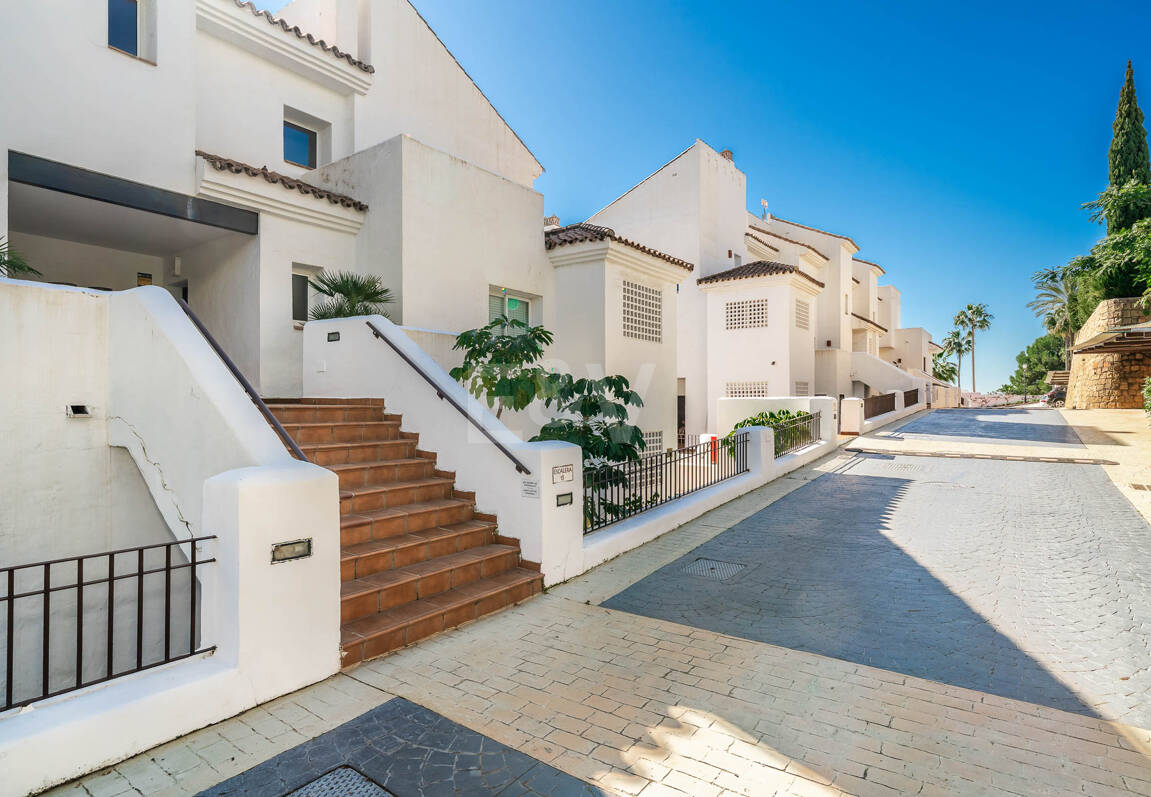 Elegant Duplex Apartment with Panoramic Sea Views in Gated and Sought-After Community