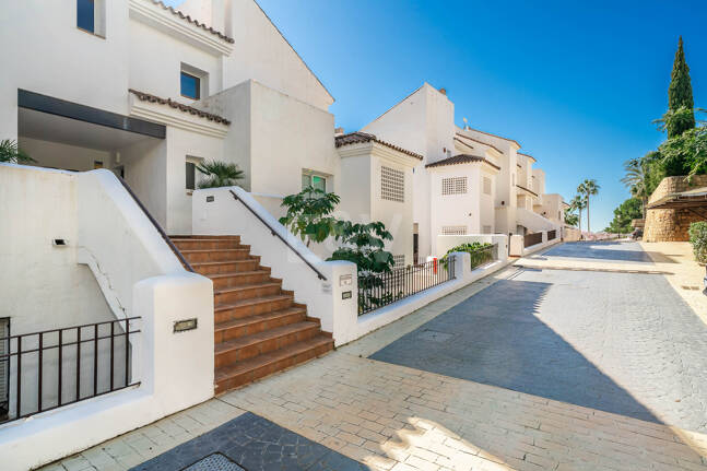 Elegant Duplex Apartment with Panoramic Sea Views in Gated and Sought-After Community