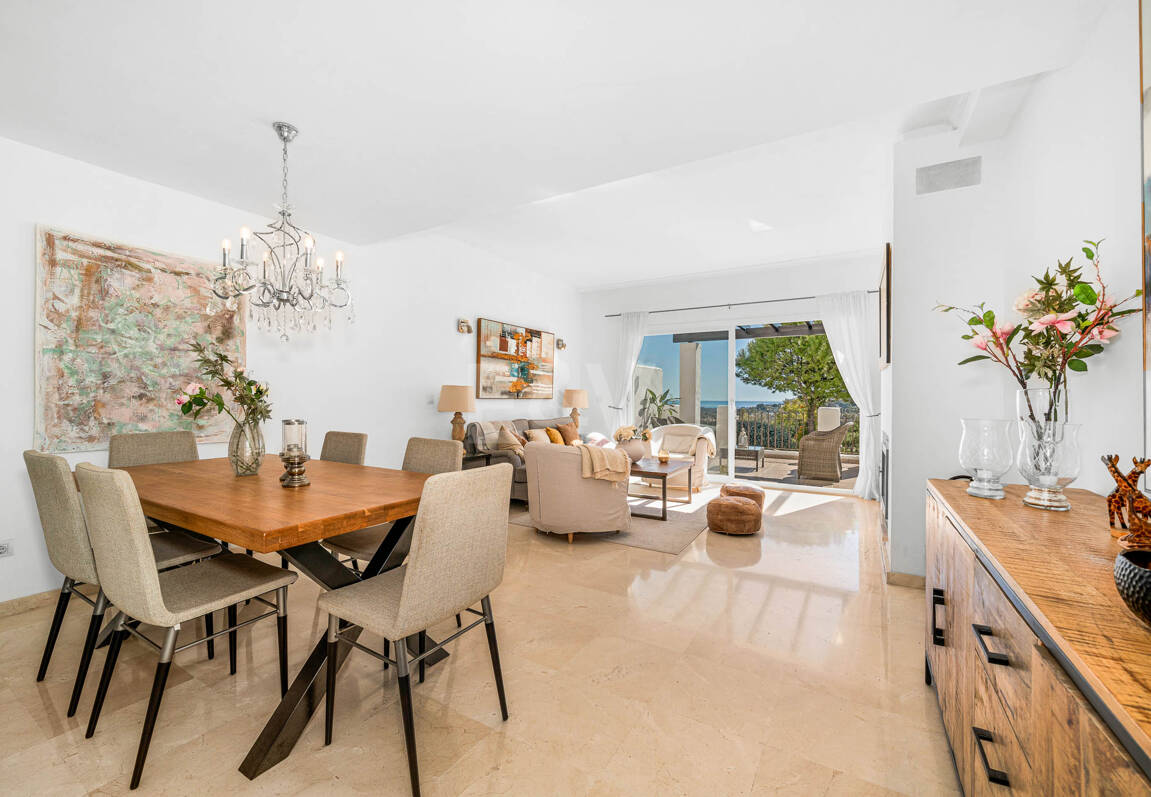Elegant Duplex Apartment with Panoramic Sea Views in Gated and Sought-After Community