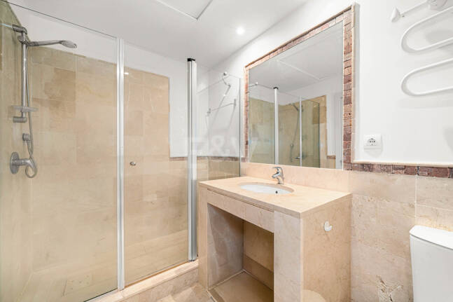 Elegant Duplex Apartment with Panoramic Sea Views in Gated and Sought-After Community