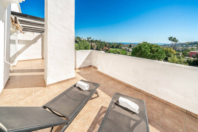 Elegant Duplex Apartment with Panoramic Sea Views in Gated and Sought-After Community