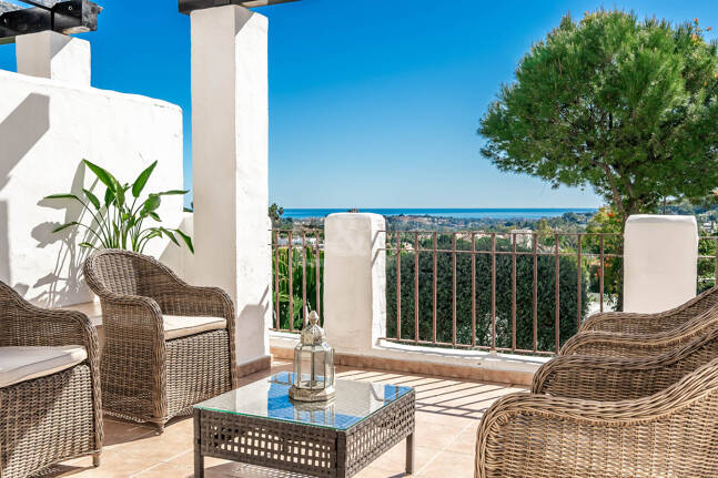 Elegant Duplex Apartment with Panoramic Sea Views in Gated and Sought-After Community