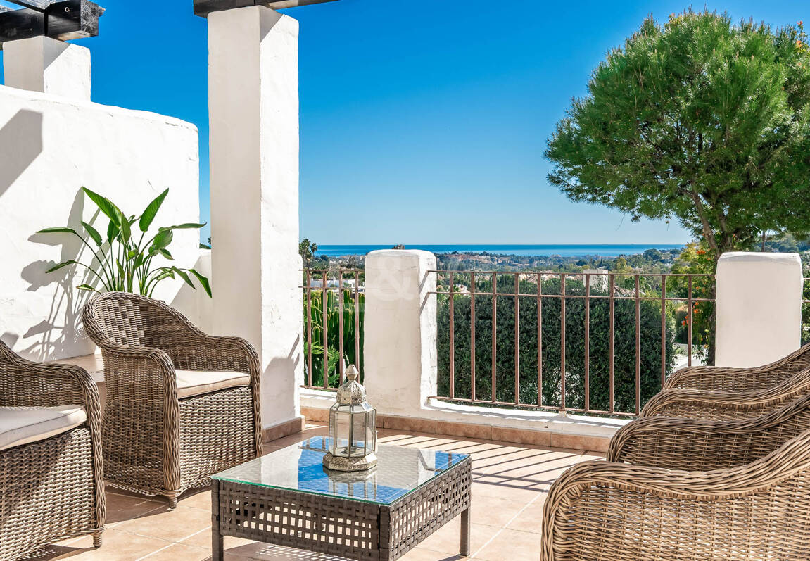 Elegant Duplex Apartment with Panoramic Sea Views in Gated and Sought-After Community