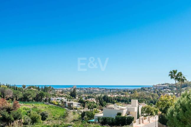 Elegant Duplex Apartment with Panoramic Sea Views in Gated and Sought-After Community