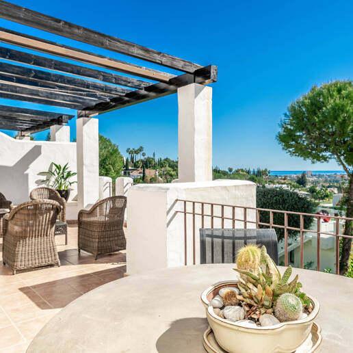 Elegant Duplex Apartment with Panoramic Sea Views in Gated and Sought-After Community