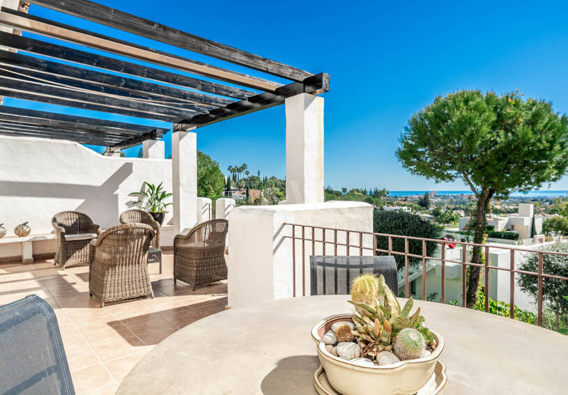 Elegant Duplex Apartment with Panoramic Sea Views in Gated and Sought-After Community