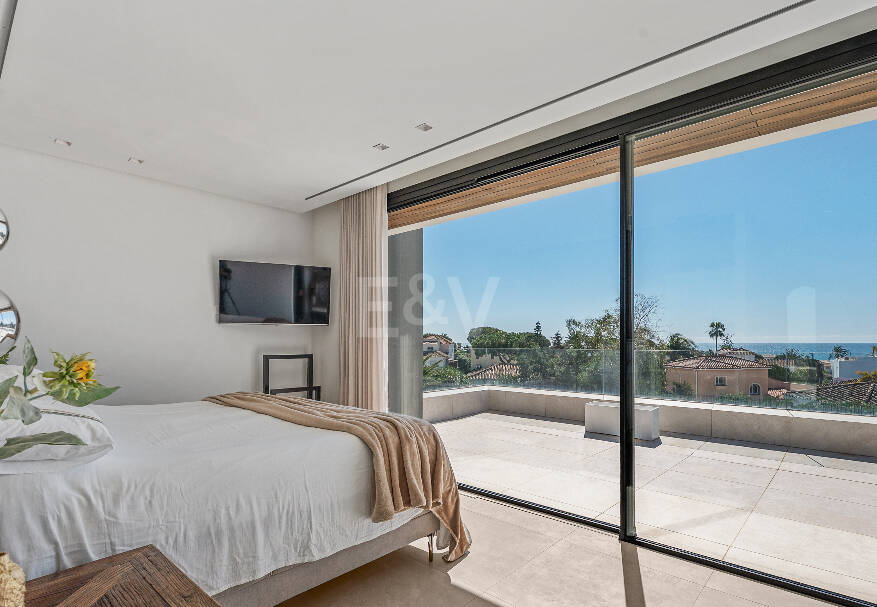 Contemporary Beachside Villa with Panoramic Sea Views