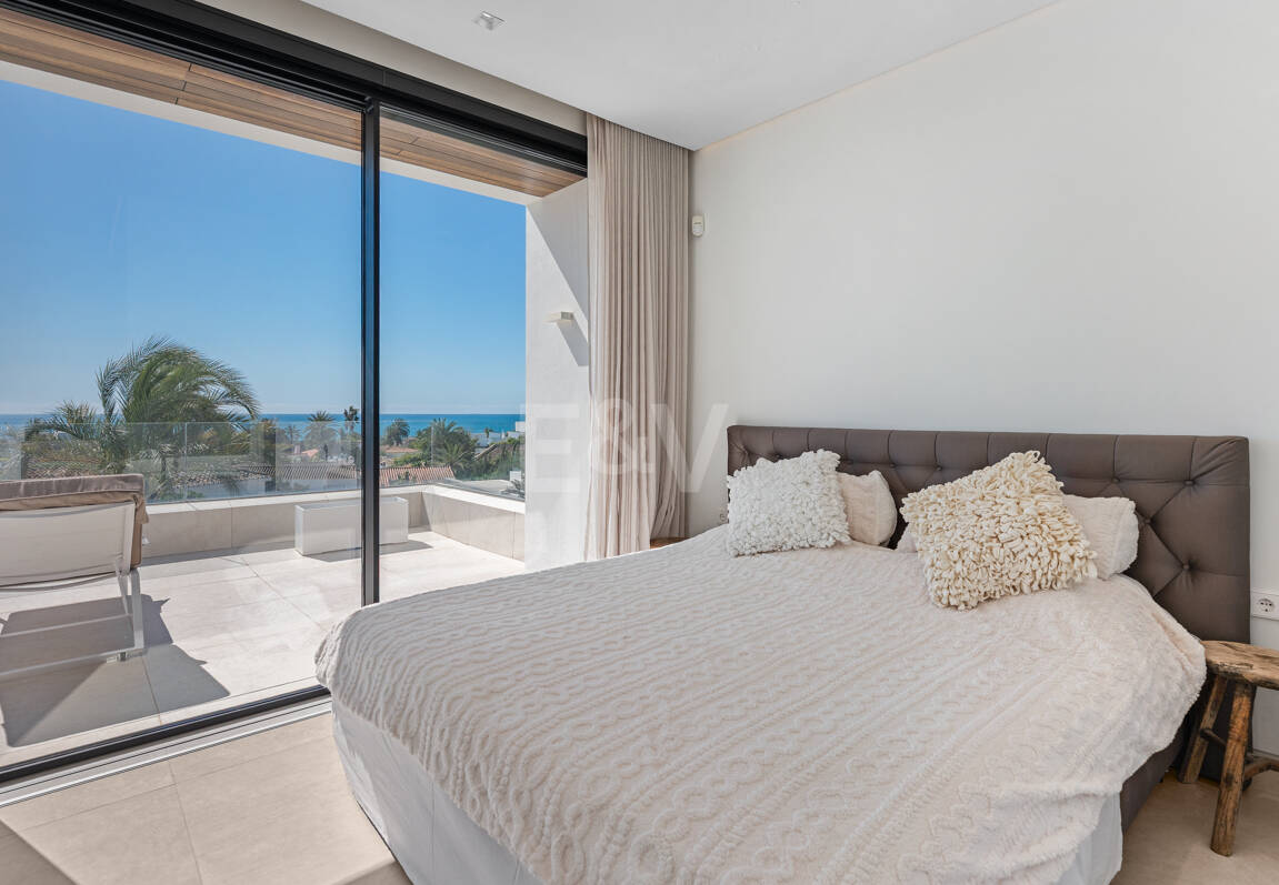 Contemporary Beachside Villa with Panoramic Sea Views