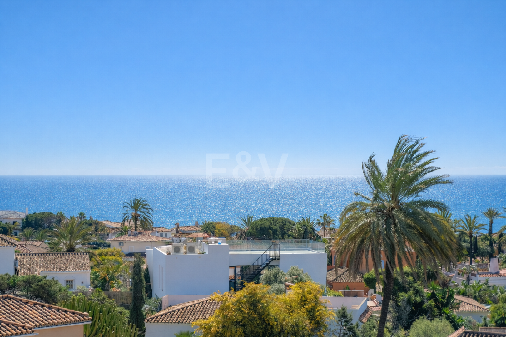 Contemporary Beachside Villa with Panoramic Sea Views