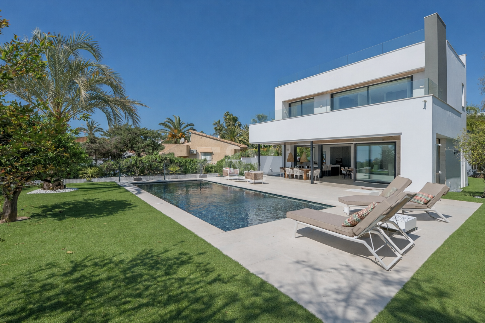 Contemporary Beachside Villa with Panoramic Sea Views