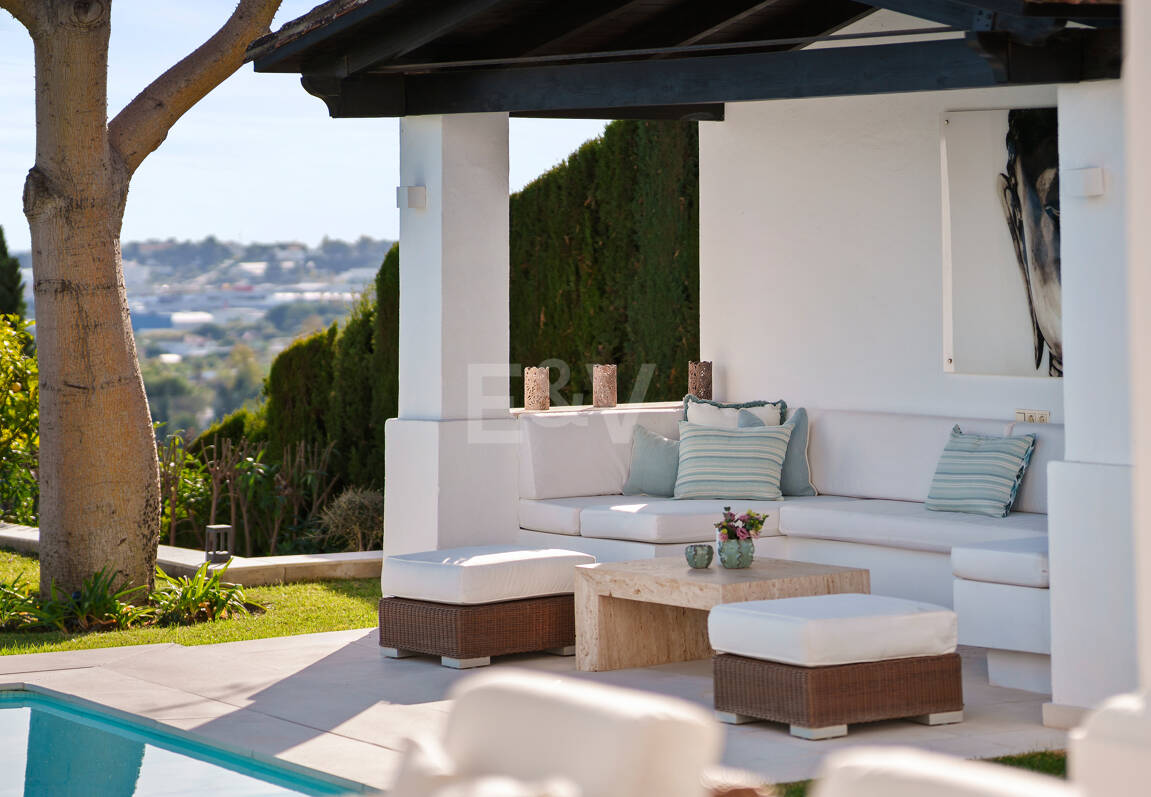 Elegant Single-Level Villa in Nueva Andalucia with Sea Views and Complete Privacy