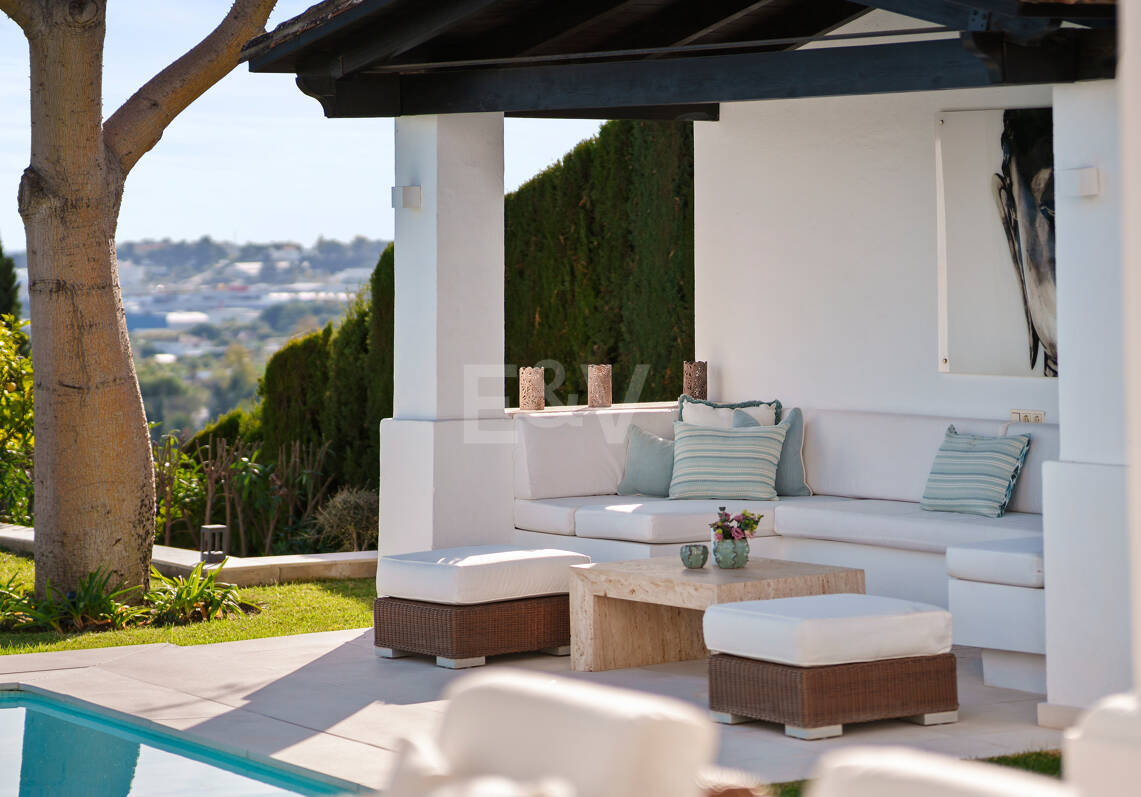 Elegant Single-Level Villa in Nueva Andalucia with Sea Views and Complete Privacy