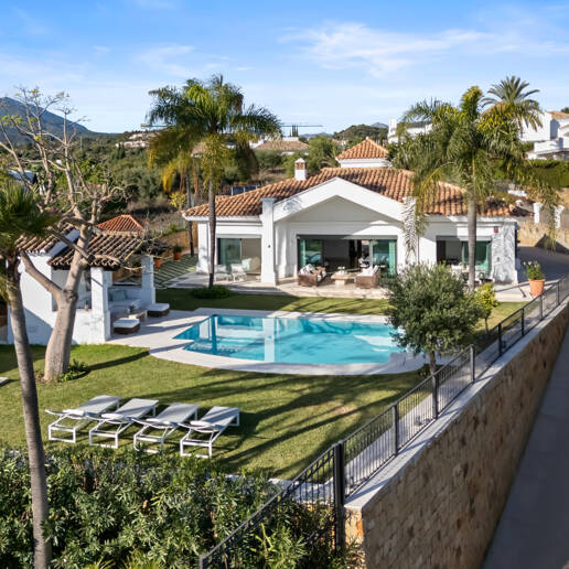 Elegant Single-Level Villa in Nueva Andalucia with Sea Views and Complete Privacy