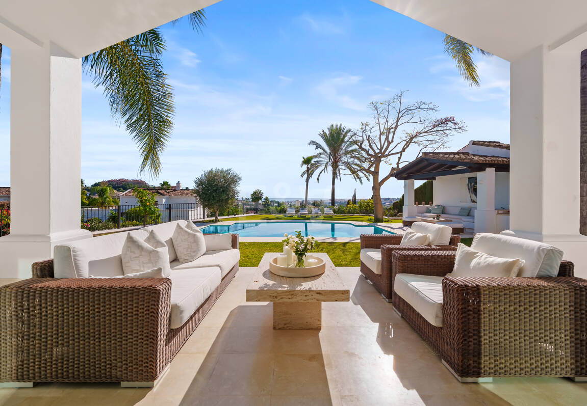 Elegant Single-Level Villa in Nueva Andalucia with Sea Views and Complete Privacy