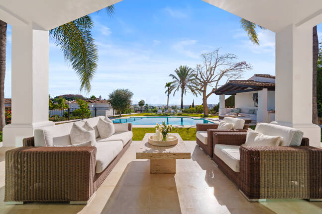 Elegant Single-Level Villa in Nueva Andalucia with Sea Views and Complete Privacy