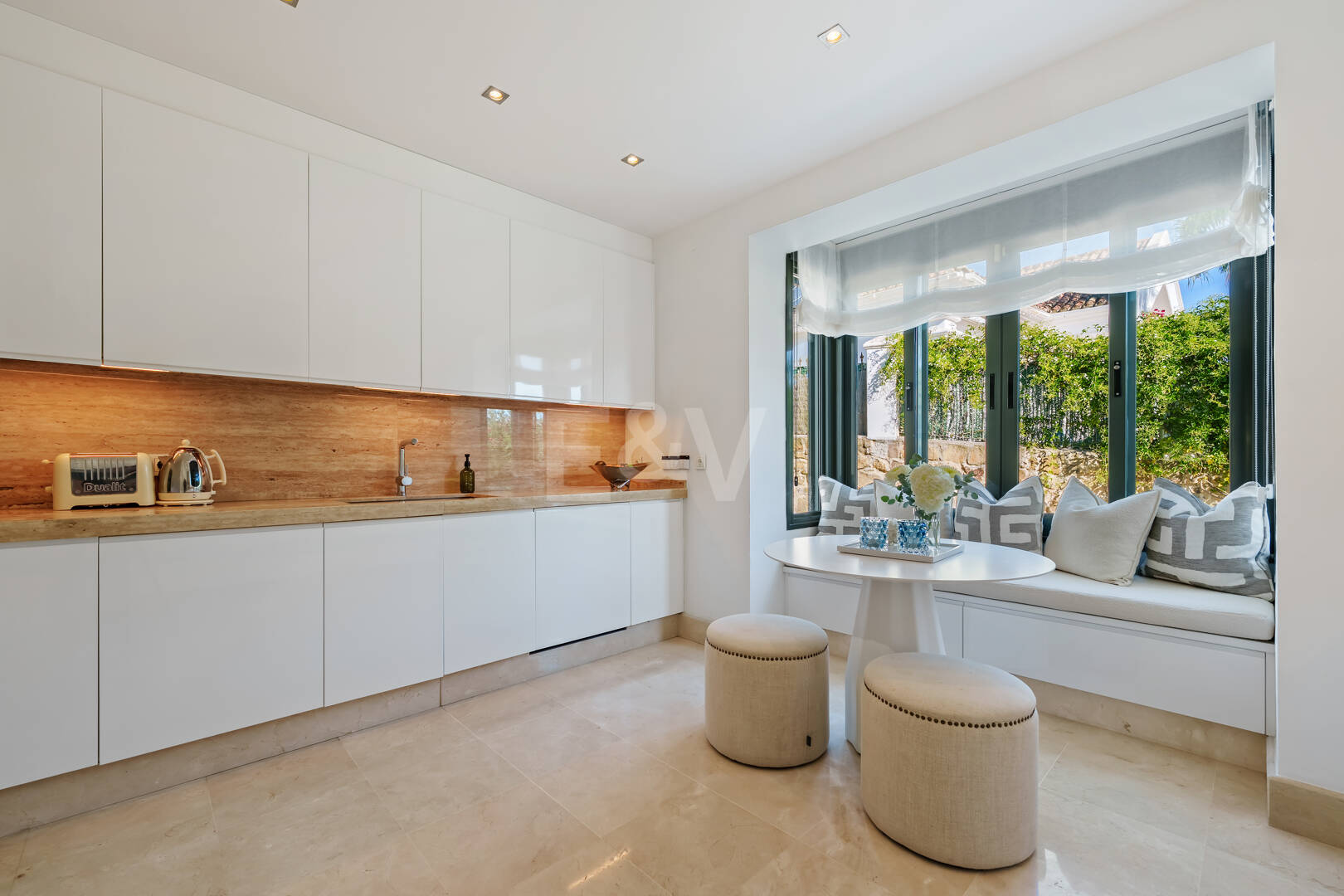 Elegant Single-Level Villa in Nueva Andalucia with Sea Views and Complete Privacy