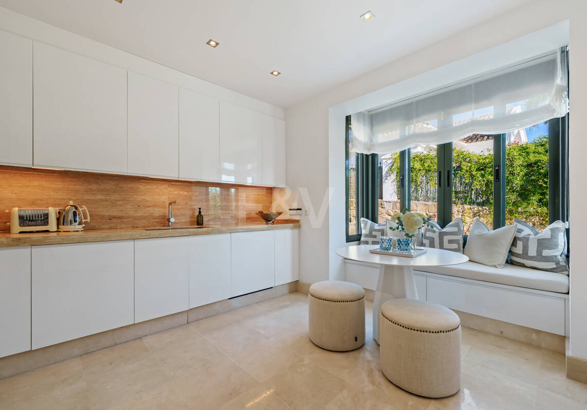 Elegant Single-Level Villa in Nueva Andalucia with Sea Views and Complete Privacy