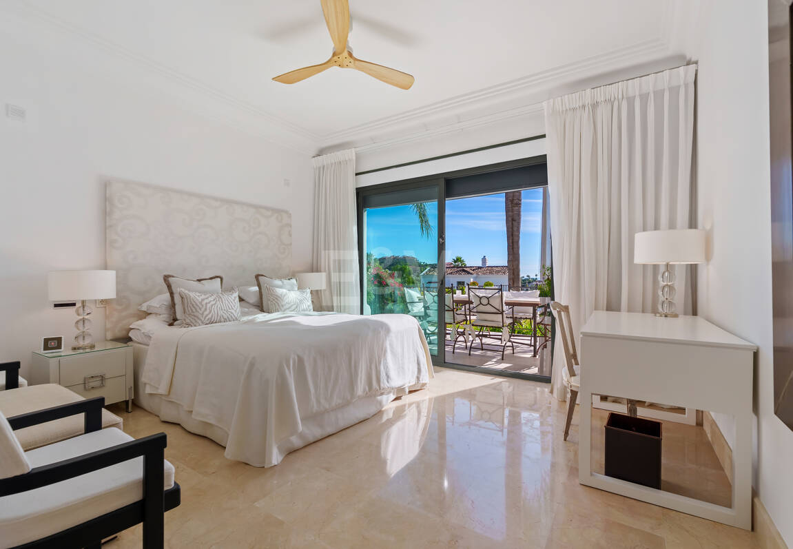 Elegant Single-Level Villa in Nueva Andalucia with Sea Views and Complete Privacy