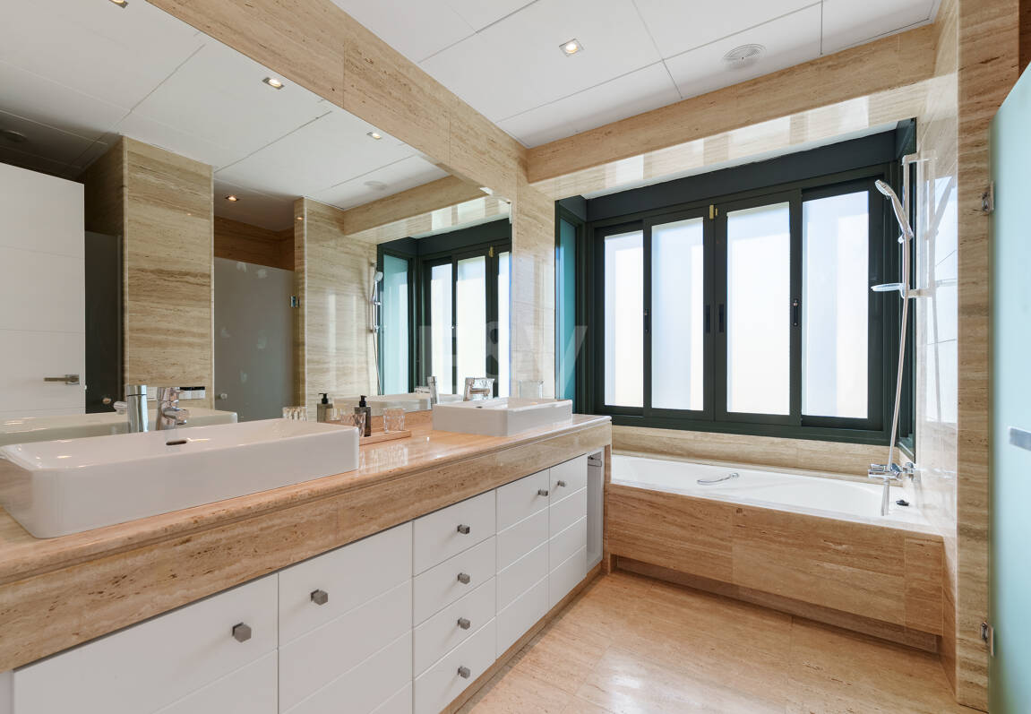 Elegant Single-Level Villa in Nueva Andalucia with Sea Views and Complete Privacy