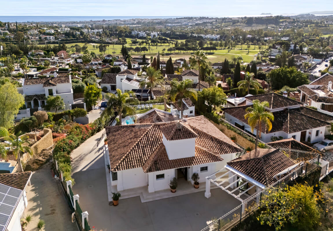 Elegant Single-Level Villa in Nueva Andalucia with Sea Views and Complete Privacy