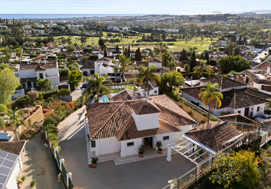 Elegant Single-Level Villa in Nueva Andalucia with Sea Views and Complete Privacy
