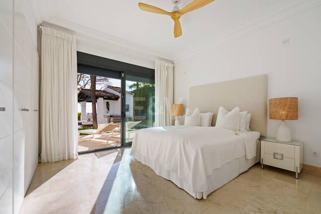 Elegant Single-Level Villa in Nueva Andalucia with Sea Views and Complete Privacy