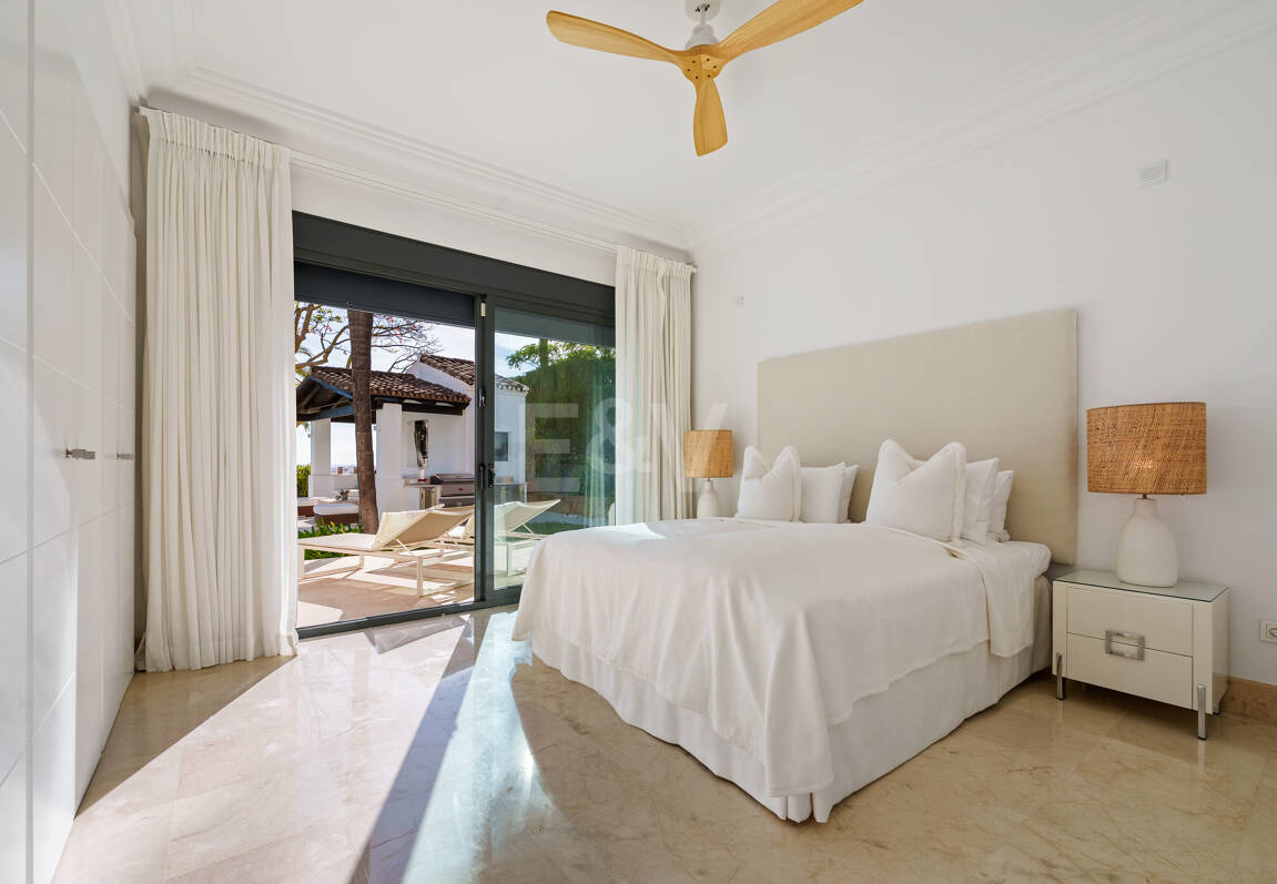 Elegant Single-Level Villa in Nueva Andalucia with Sea Views and Complete Privacy