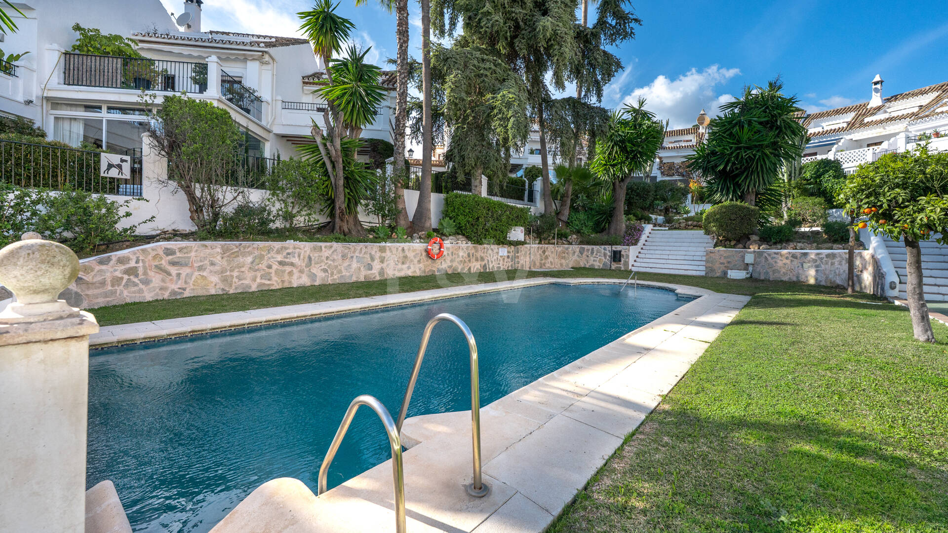 Andalusian Style Townhouse with Private Outdoor Spaces and Outstanding Upgrade Potential