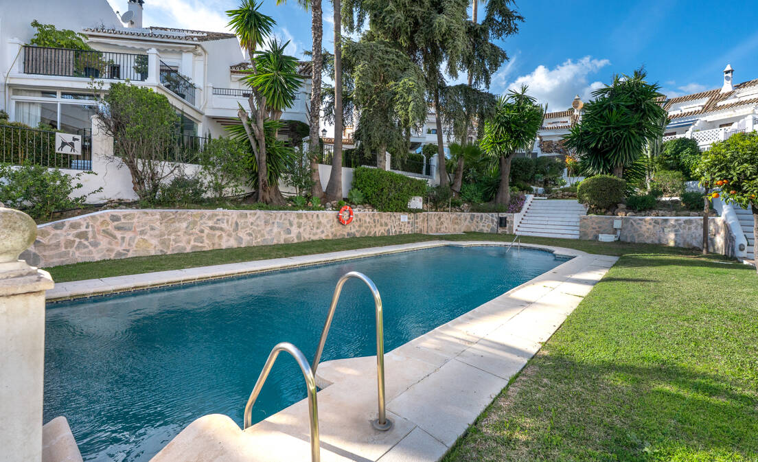 Andalusian Style Townhouse with Private Outdoor Spaces and Outstanding Upgrade Potential