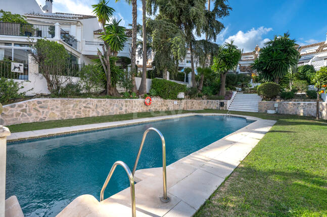 Andalusian Style Townhouse with Private Outdoor Spaces and Outstanding Upgrade Potential