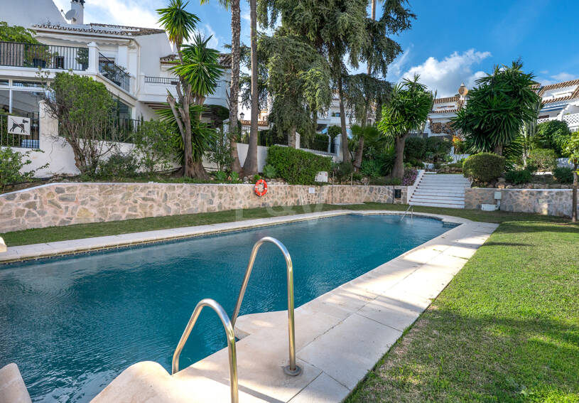 Andalusian Style Townhouse with Private Outdoor Spaces and Outstanding Upgrade Potential