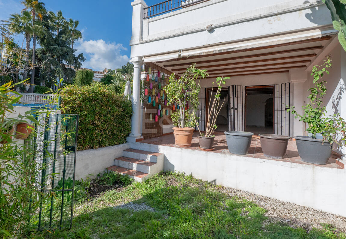 Andalusian Style Townhouse with Private Outdoor Spaces and Outstanding Upgrade Potential